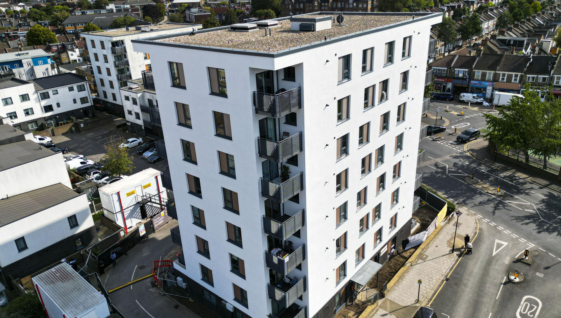 Aerial view of the completed rendered façade at Baritone Court in Stratford, London.