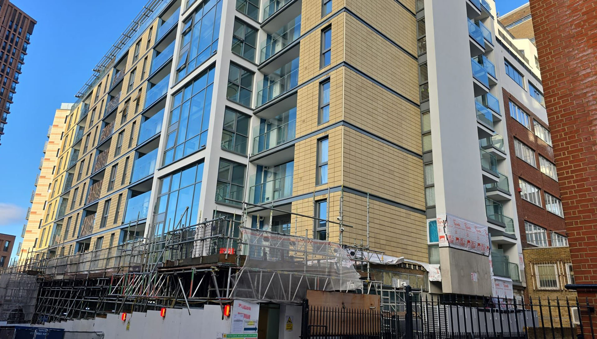 Façade remediation works in progress at Whitgift Street, Croydon, with scaffolding installed around the residential building.